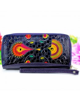 Purses and handbags in genuine embossed leather